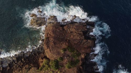 Panoramic view of rock formation in sea