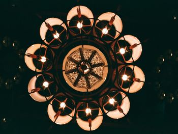 Low angle view of illuminated chandelier