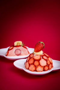 Close-up of strawberries in plate on table