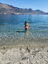 Full length of woman on beach