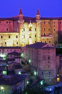 View of illuminated buildings in city