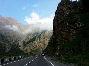 Road leading towards mountains