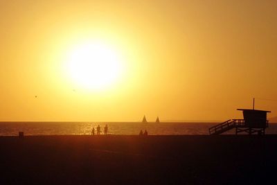 Scenic view of sea at sunset