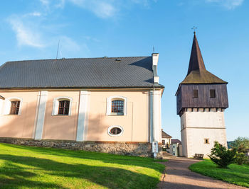 Wooden renaissance bell tower at church of all saints was built in 1610 on hill in hronov, czechia.