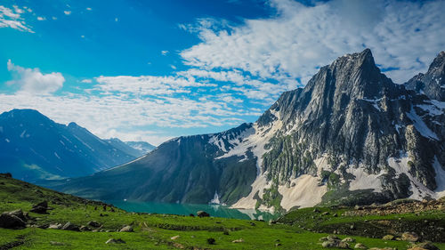 Panoramic view of snowcapped mountains against sky