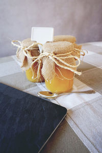 Drink in jars on tablecloth