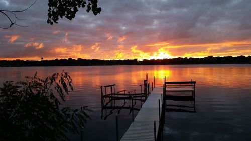 Scenic view of lake against cloudy sky