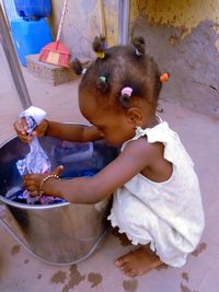 High angle view of cute girl holding food