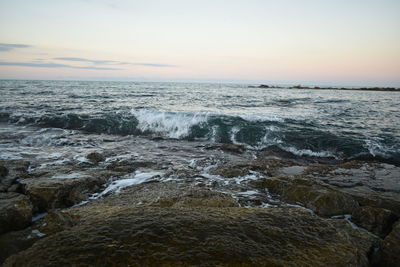 Scenic view of sea against sky during sunset