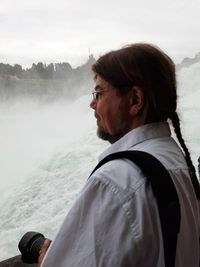 Portrait of man looking at sea