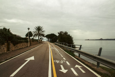 Empty road against sky