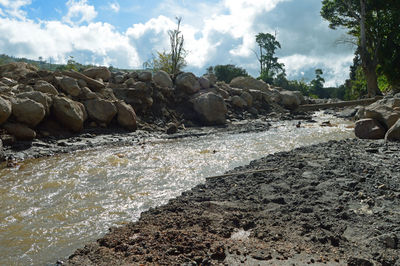 Rocks on land against sky