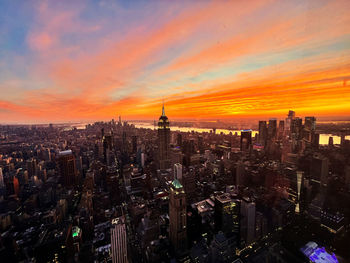 High angle view of cityscape against sky during sunset