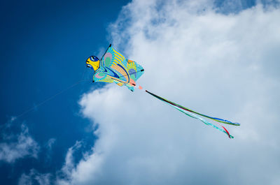 Low angle view of flag against sky