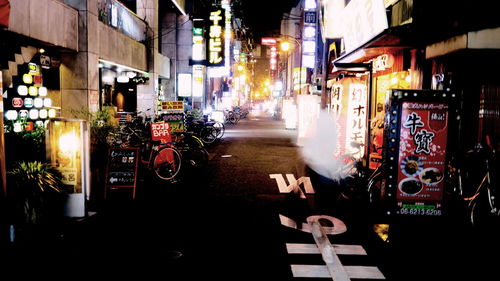 Illuminated street at night