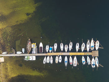 Directly above shot of boats moored by pier