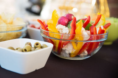 Close-up of fruits in bowl on table