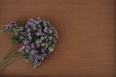 High angle view of purple flowering plant on table