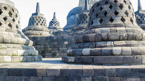 Ancient temple against building