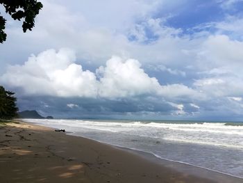 Scenic view of beach against sky