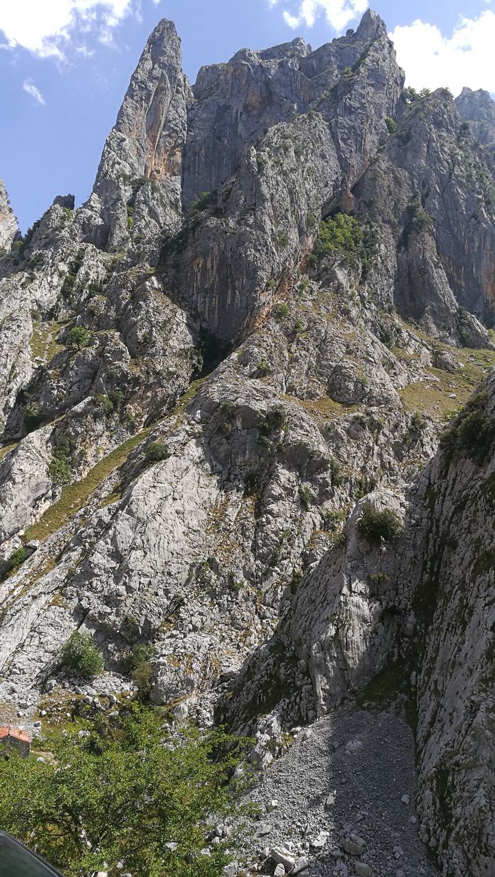 LOW ANGLE VIEW OF MOUNTAINS