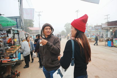 People on street in city