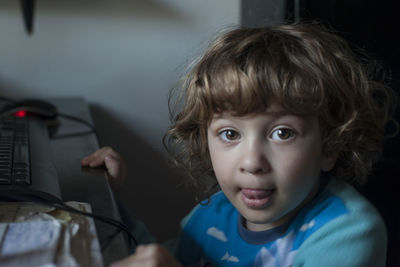 Portrait of cute boy at home