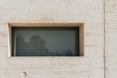 Exterior of building with window during sunny day