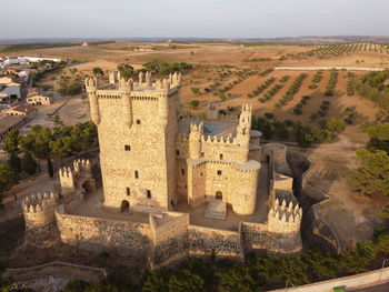 High angle view of historic building against sky