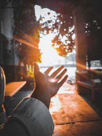 Cropped image of man hand on floor