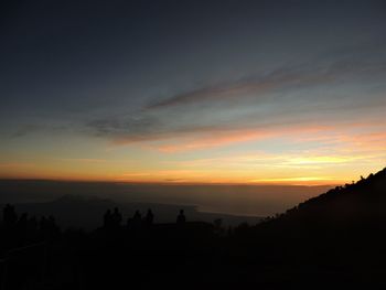 Scenic view of silhouette landscape against sky during sunset