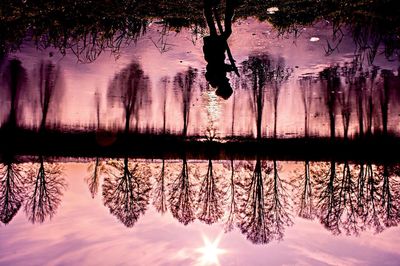 Scenic view of lake at sunset