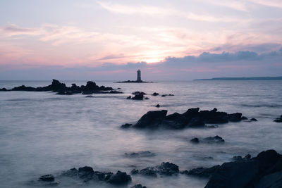 Scenic view of sea against sky during sunset