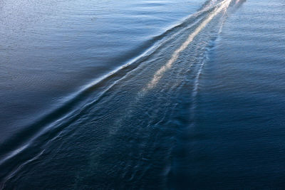 Wake of ship on water surface . waves created by the motion of the ship