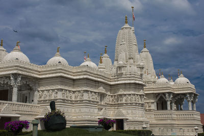 Low angle view of statue against sky