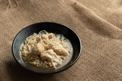 High angle view of pasta in bowl on table