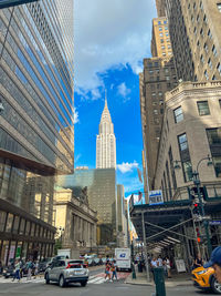 Low angle view of skyscrapers against sky