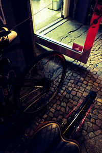 High angle view of bicycle on sidewalk