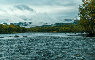 Scenic view of river against sky