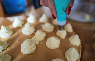 Midsection of person preparing food