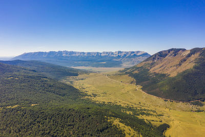 Scenic view of landscape against clear sky