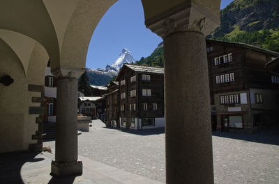 Buildings in city against sky