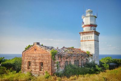 Lighthouse against blue sky