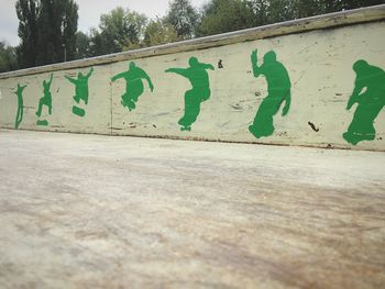 Close-up of graffiti on wall