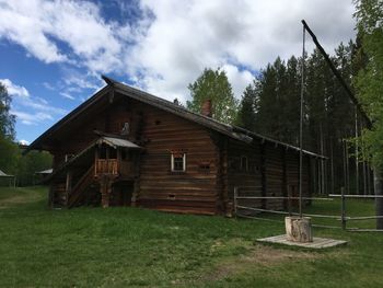 House on field against sky