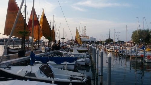 Boats moored at harbor