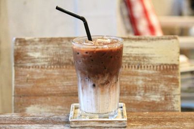 Close-up of iced coffee on table