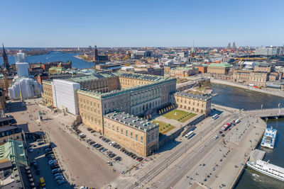 The royal palace is located in gamla stan island in stockholm, sweden. drone point of view