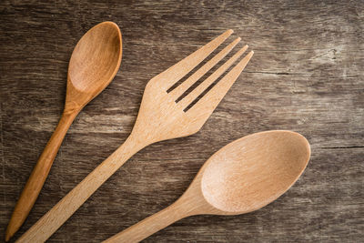 High angle view of fork and spoon on table