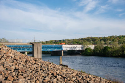 Bridge over river against sky